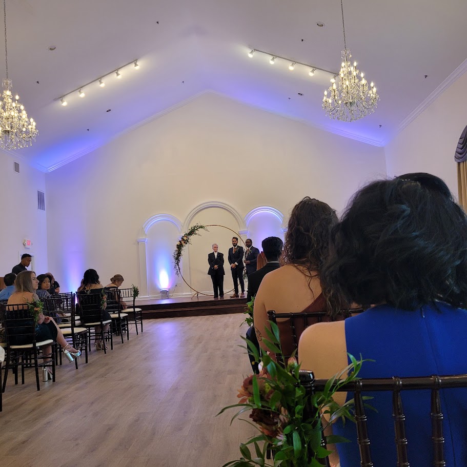 groom at altar waiting on bride to walk down aisle