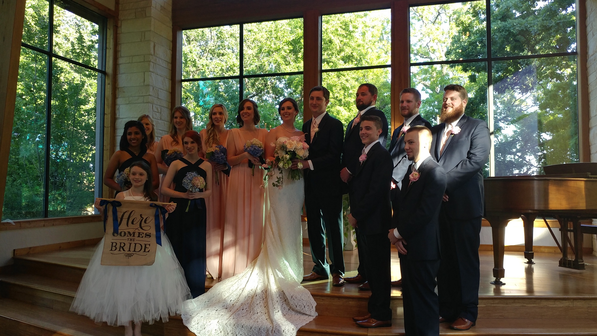 bride and groom with wedding party
