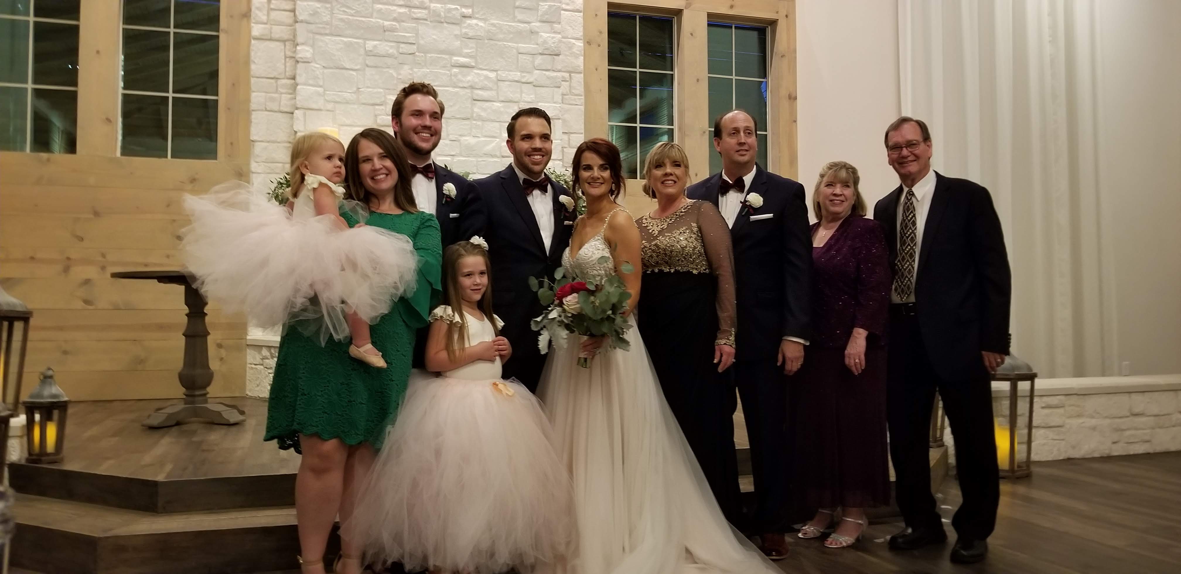 bride and groom with families