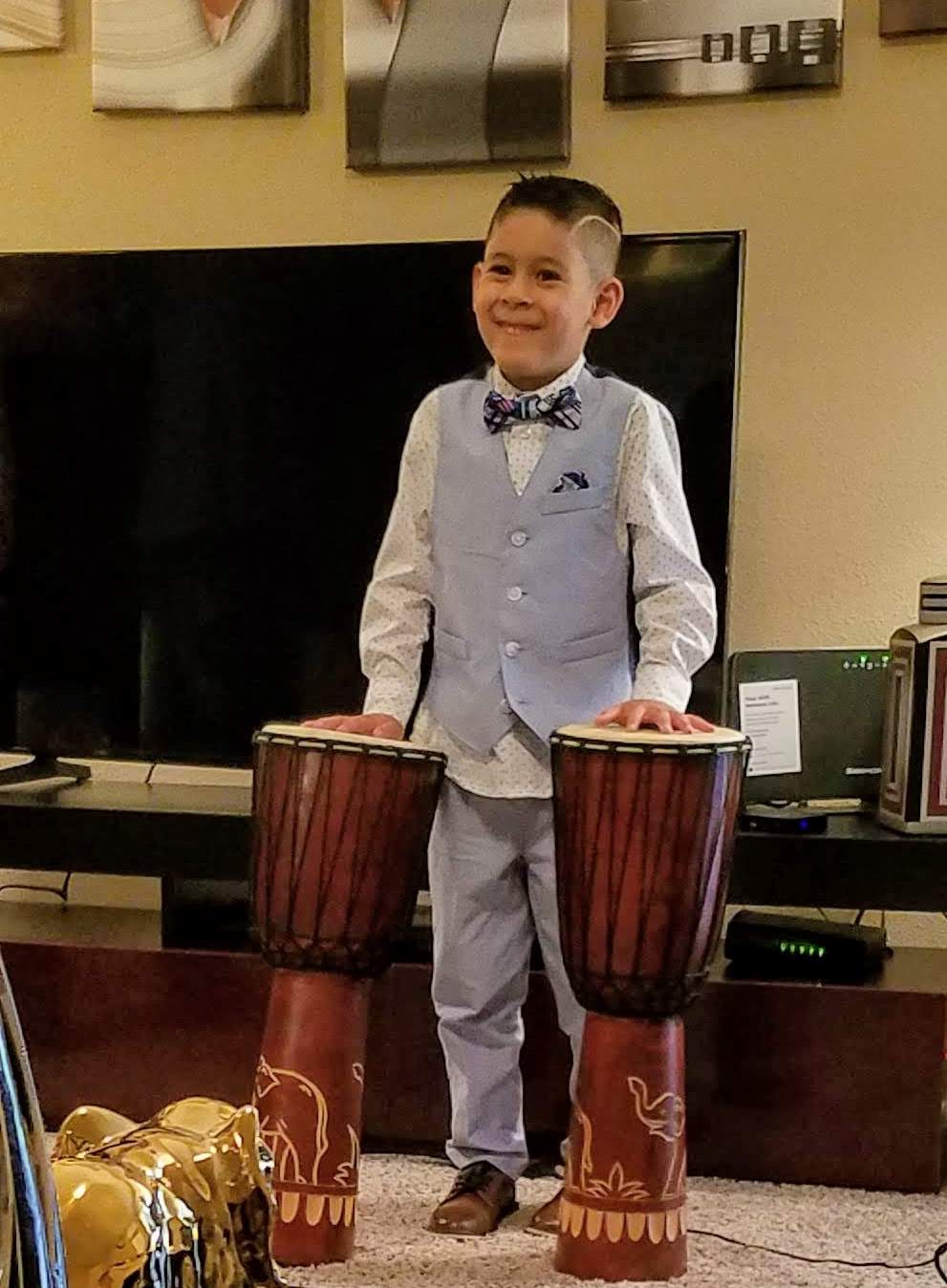 boy playing drums
